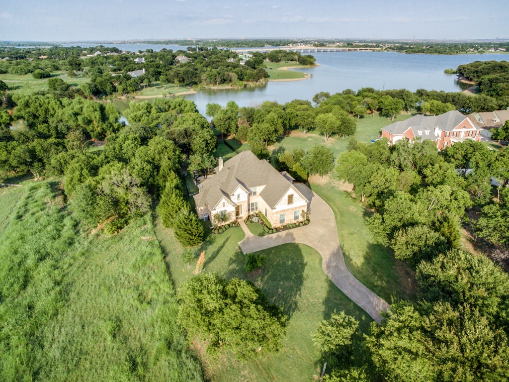 Sits next to Army Corp. land leaving the surrounding area natural.  t doesn't get any better over the water than during the colorful 4th of July fireworks! come visit this builder's lakefront dream and see what you've been missing!  