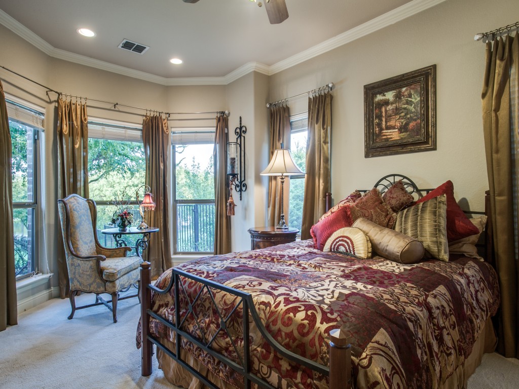 Bay windows at the sitting area are again seen in the 2nd Master that has been upgraded with hardwood floors and used as a 2nd office. Private access to the side yard where the owner shoots hoops with her son