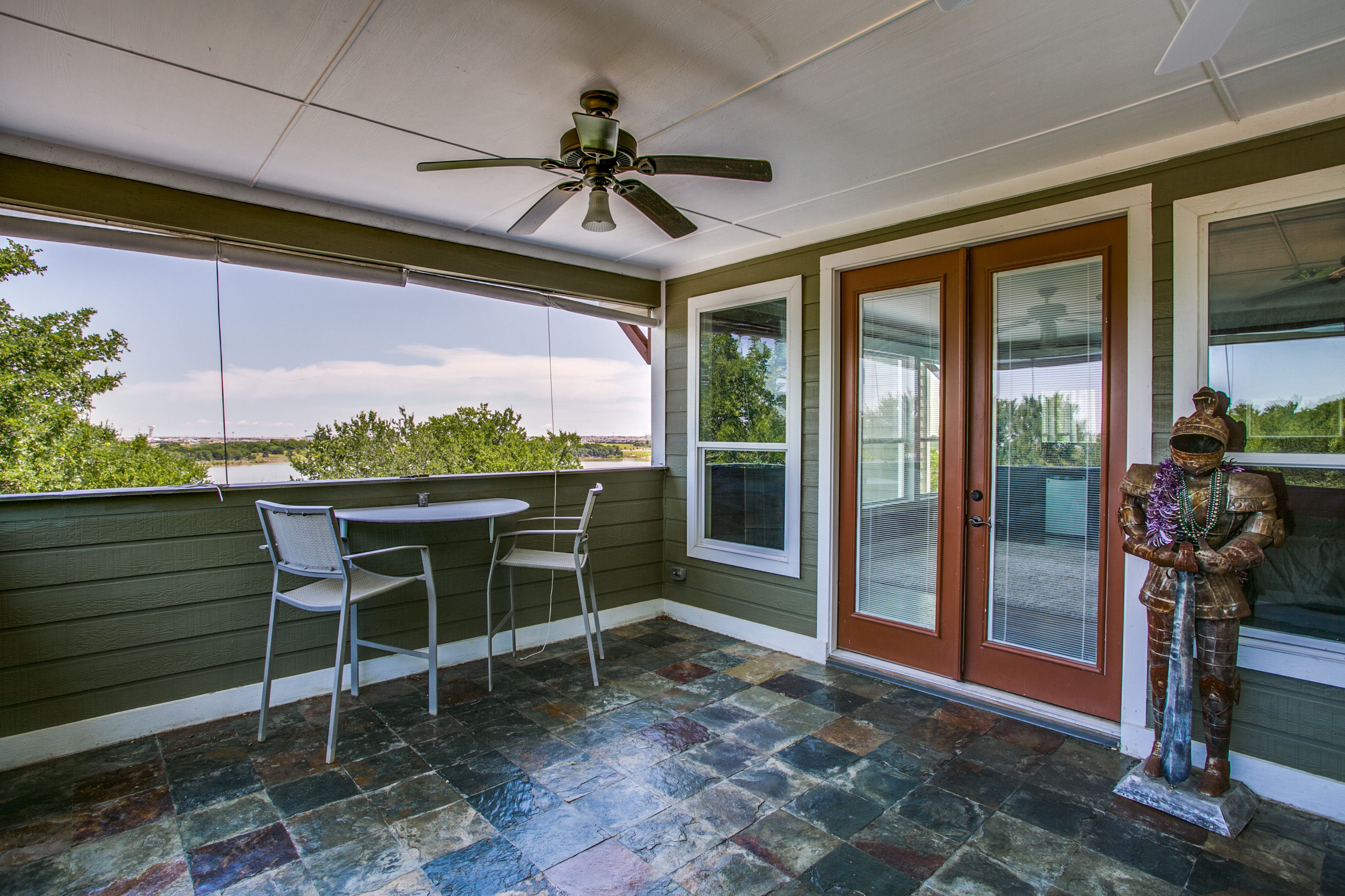 Again, great personality is seen in the Master suite's private balcony that opens to gorgeous Lake Lewisville.