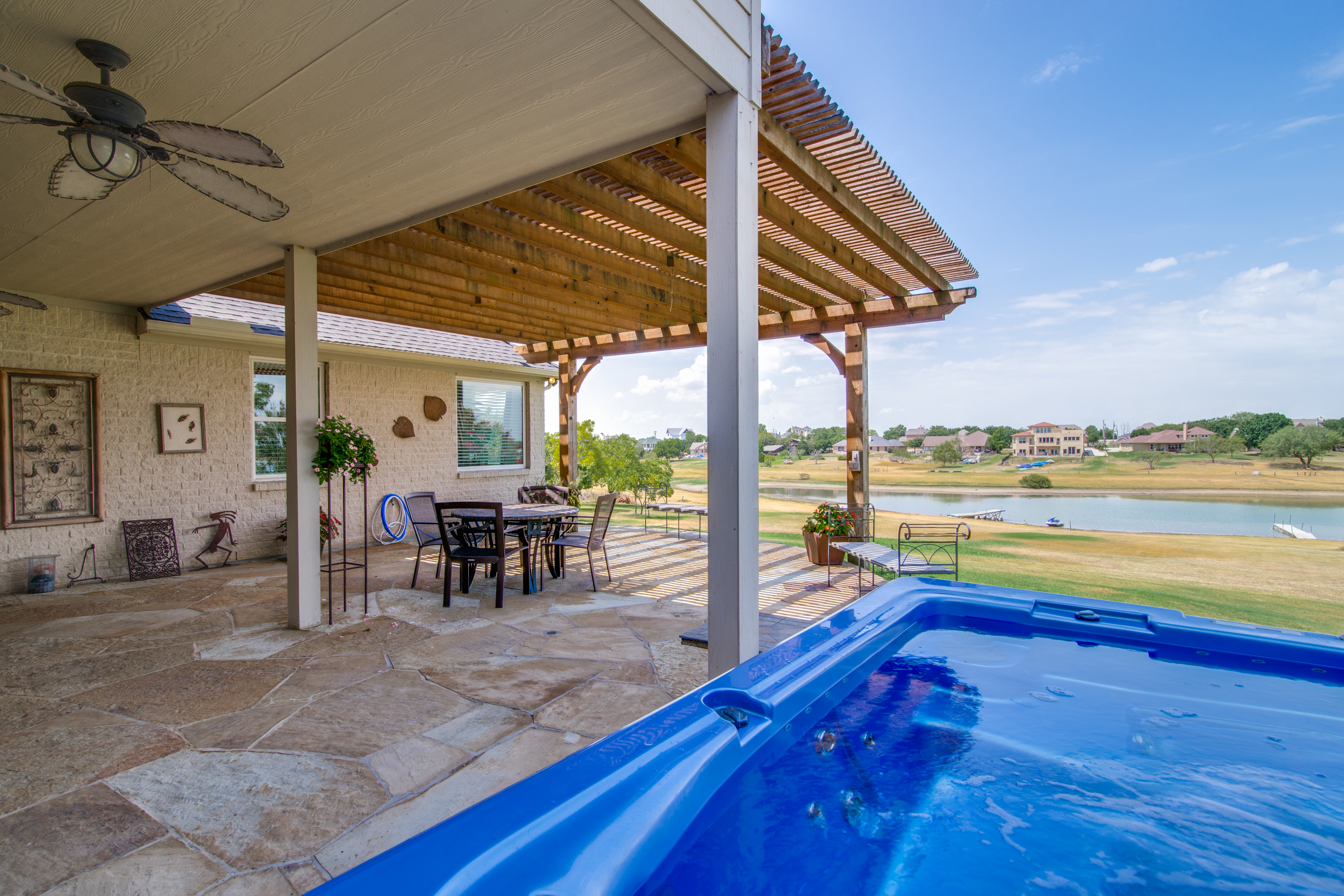 Large covered patio & hot tub for the days on the lake